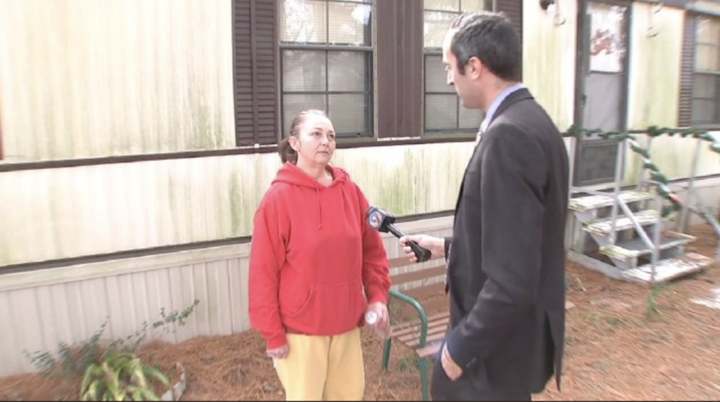 Reporter Joe Bruno interviews Cheryl Kinlaw.