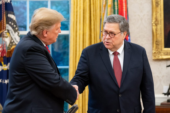 AG William Barr shakes hands with Donald Trump in the Oval Office