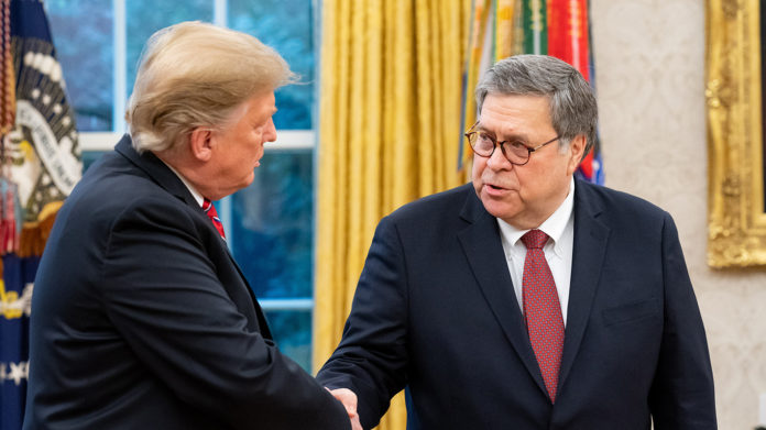President Trump and William Barr shake hands in the Oval Office